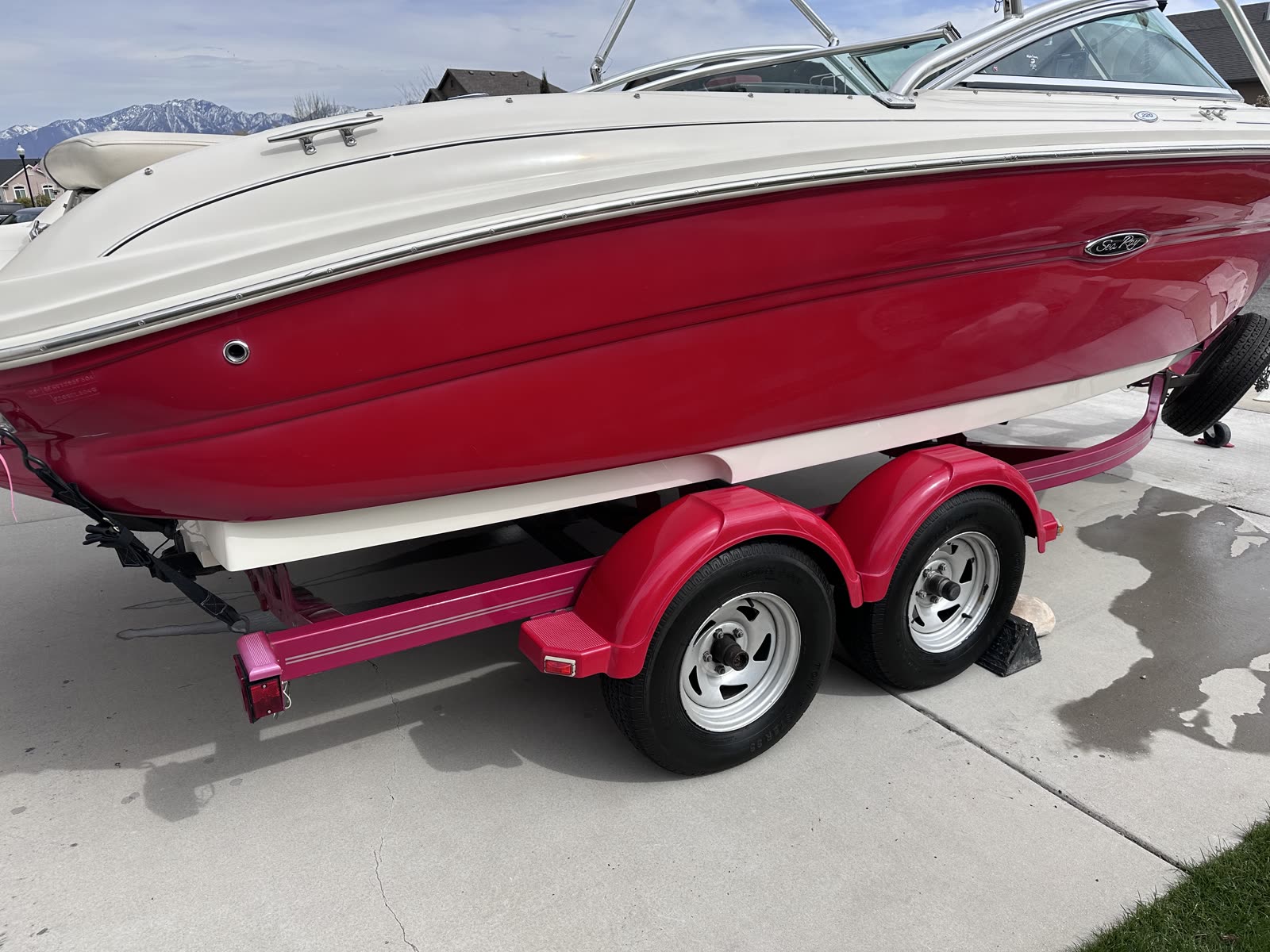 Sea Ray on trailer with Utah mountains behind